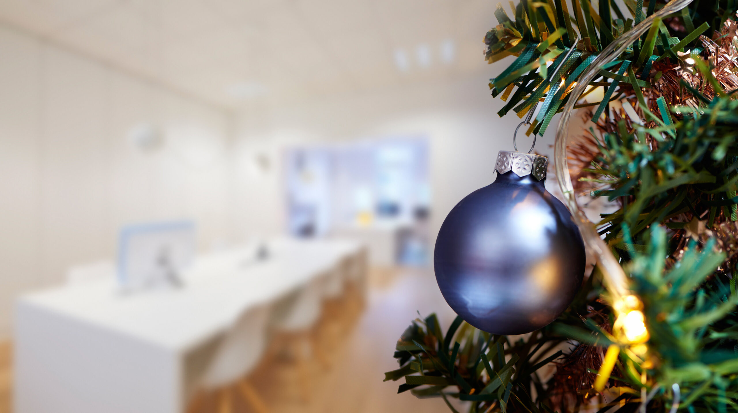 Christmas bauble on a tree in a meeting room